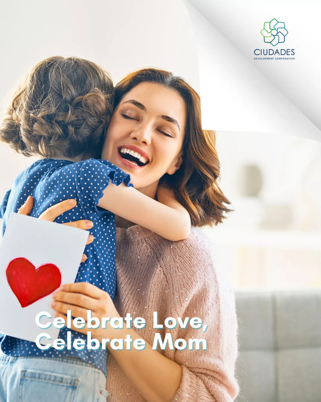 Child giving a card to her mother for Mother's Day.