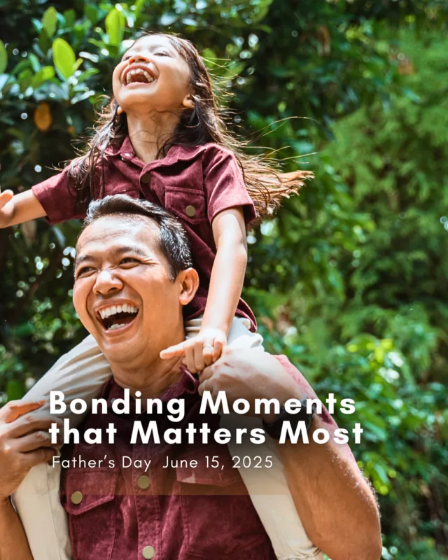 Father and child enjoying nature outdoors in a safe, gated community.